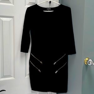 Above the knee 3/4 length sleeve express dress. Cute for work or a night out.